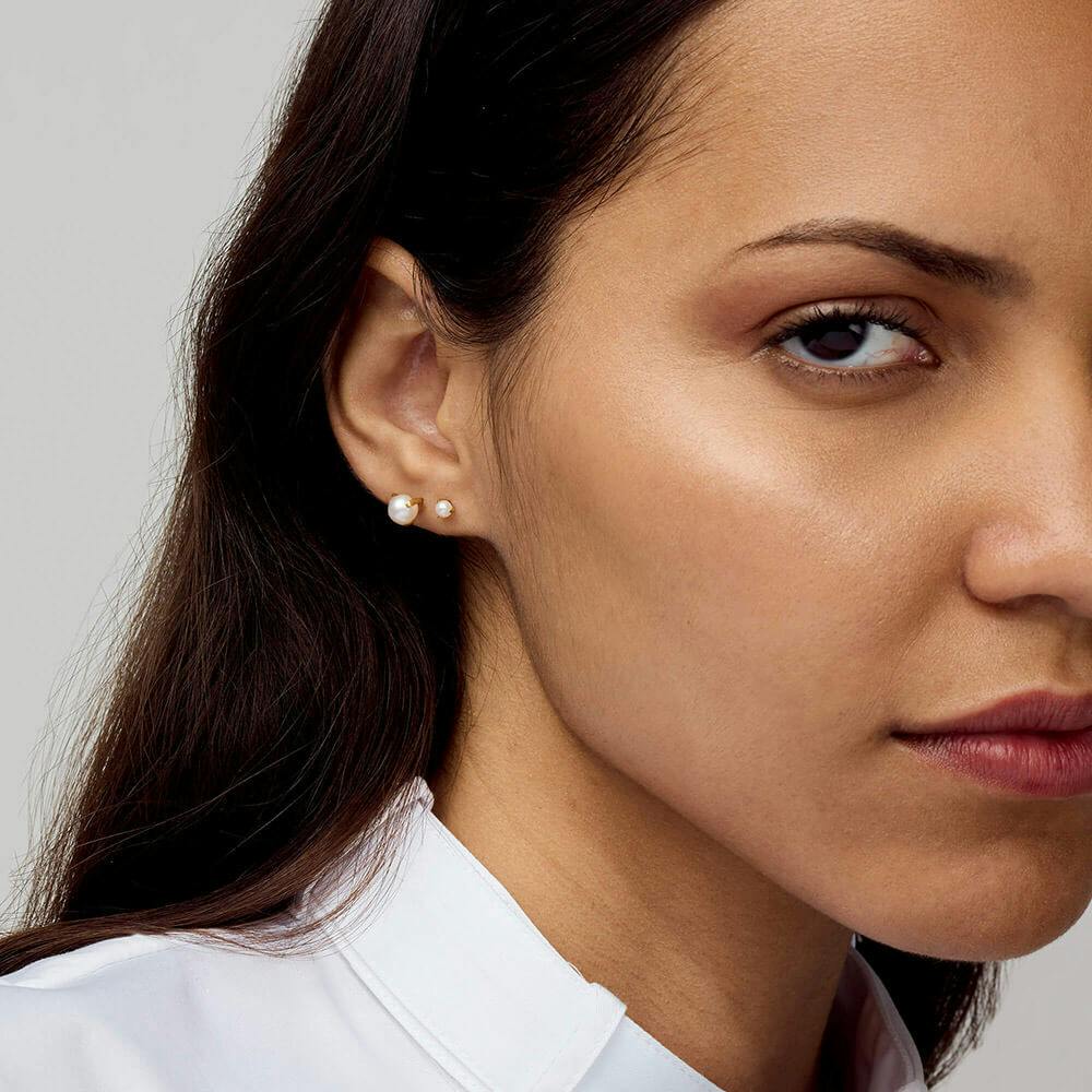 3mm and 6mm Pearl Nap Earrings on model in gold