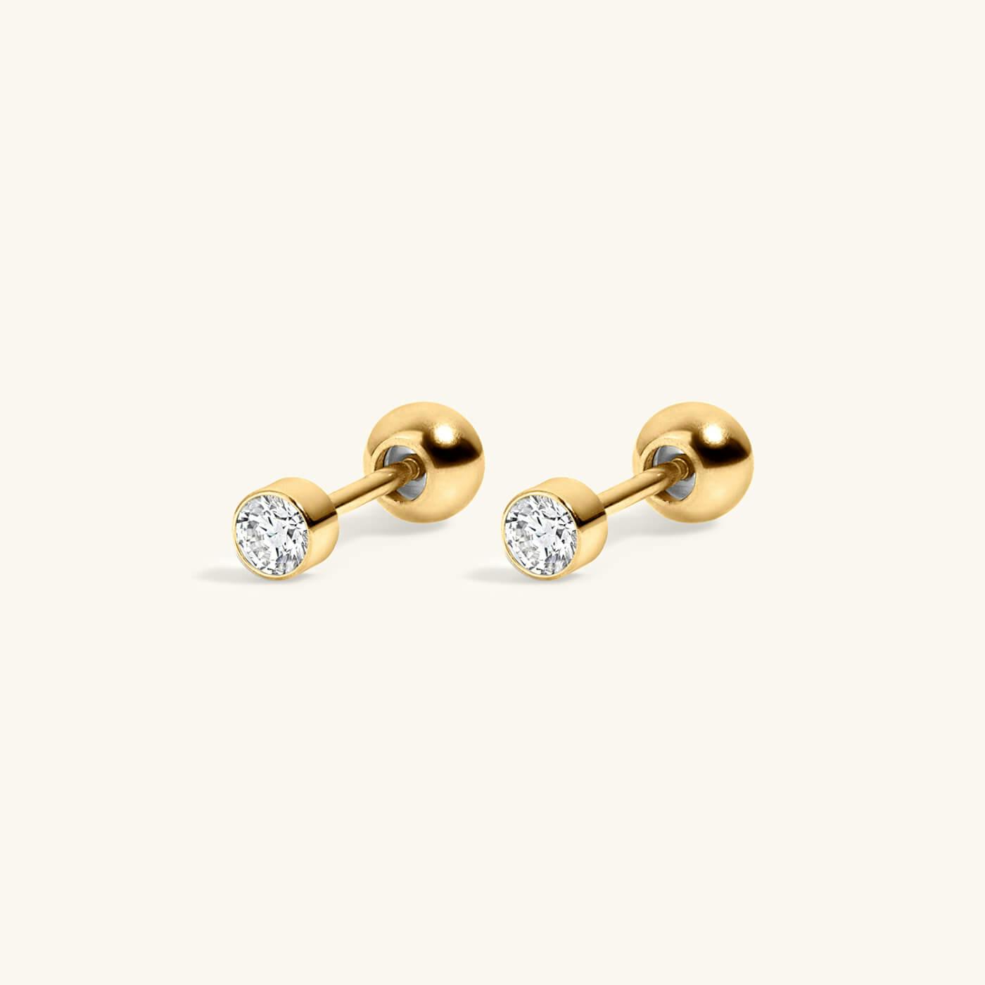 Tiny Crystal Studs in Titanium (Gold)