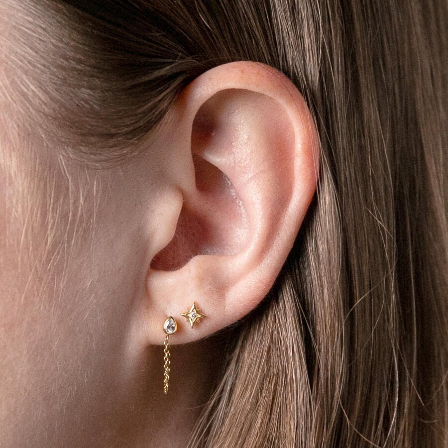 North Star Nap Earrings (Gold) on model