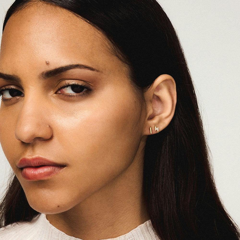Little Bar and Pave Lightning Push Pin Flat Back Earring on model in gold