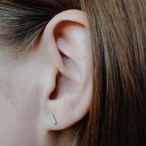 Pave Bar Push Pin Flat Back Earring in Gold on model