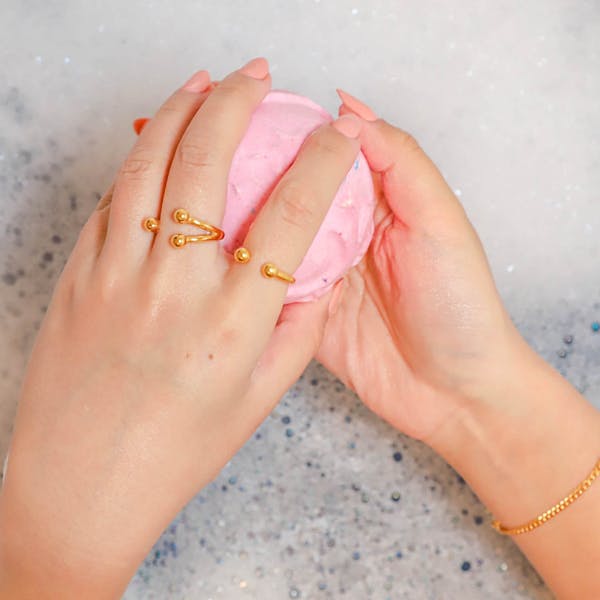 Floating Sphere Stacking Ring III in Gold on model