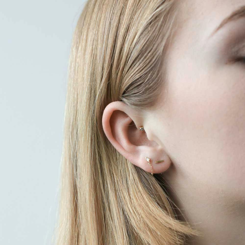 Little Bar Nap Earrings (Gold) on model