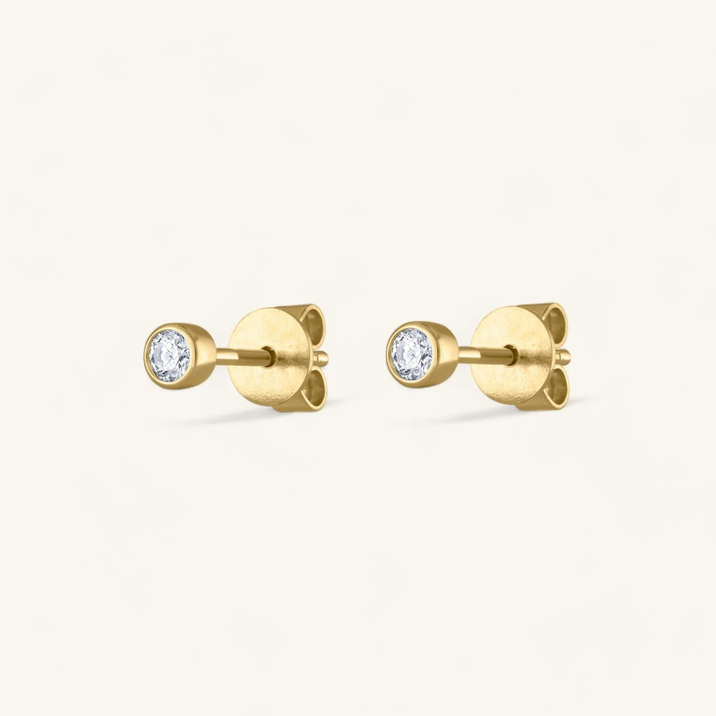 Tiny Diamond Studs in 14K Gold