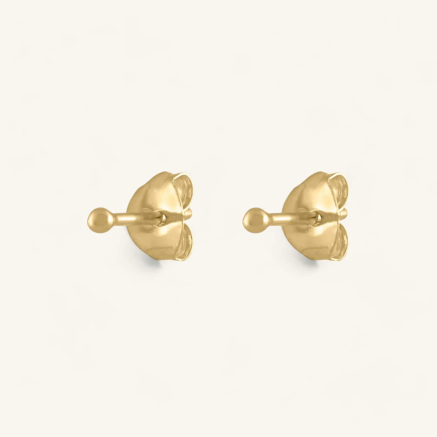 Tiny Secret Studs in 14k Gold