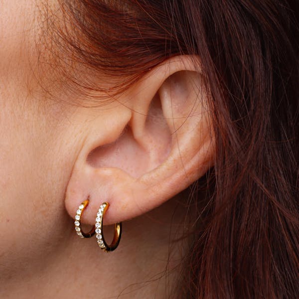 Eternity Hoop Earrings in Titanium (Gold) on model