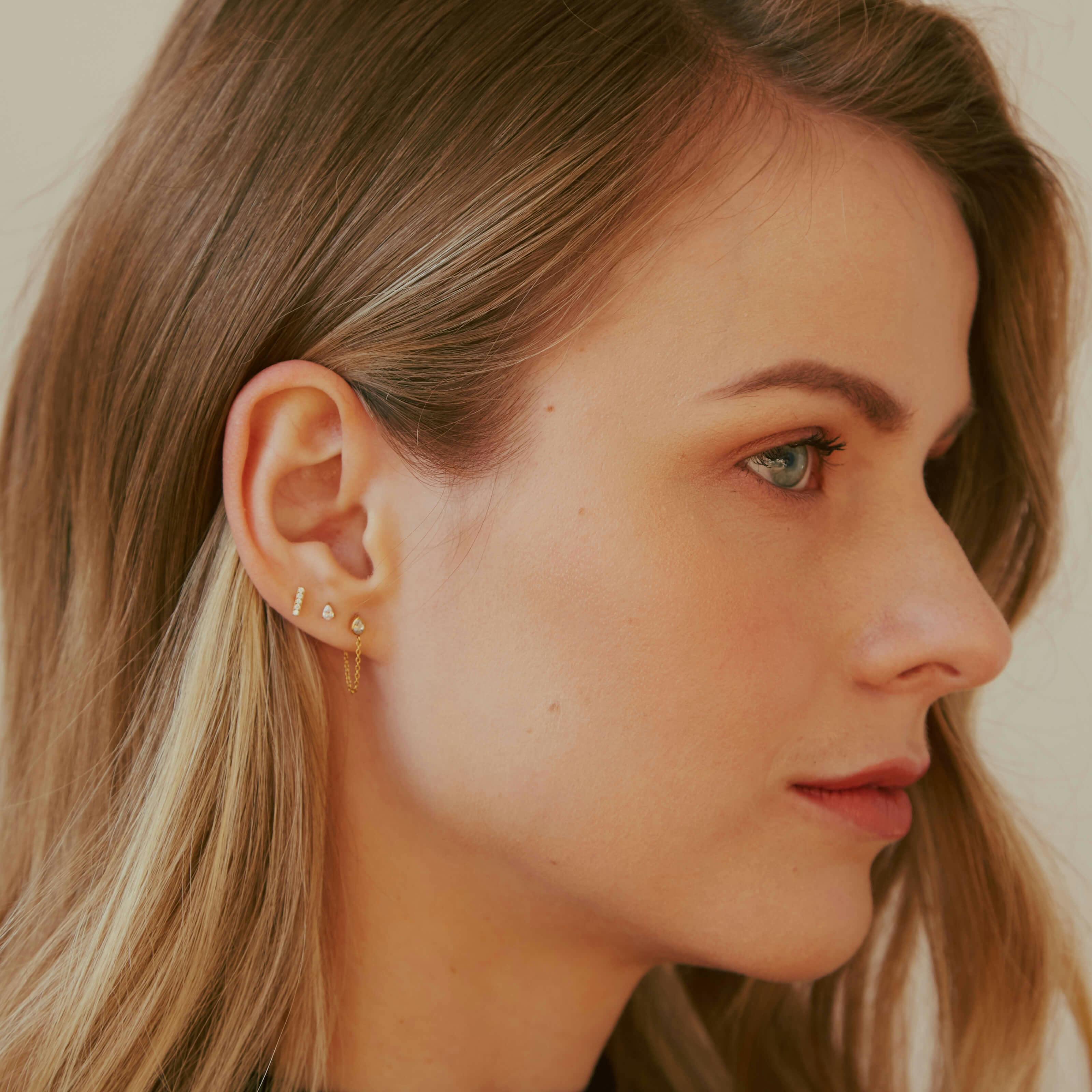 Iconic Nap Earrings Trio (Gold) on model