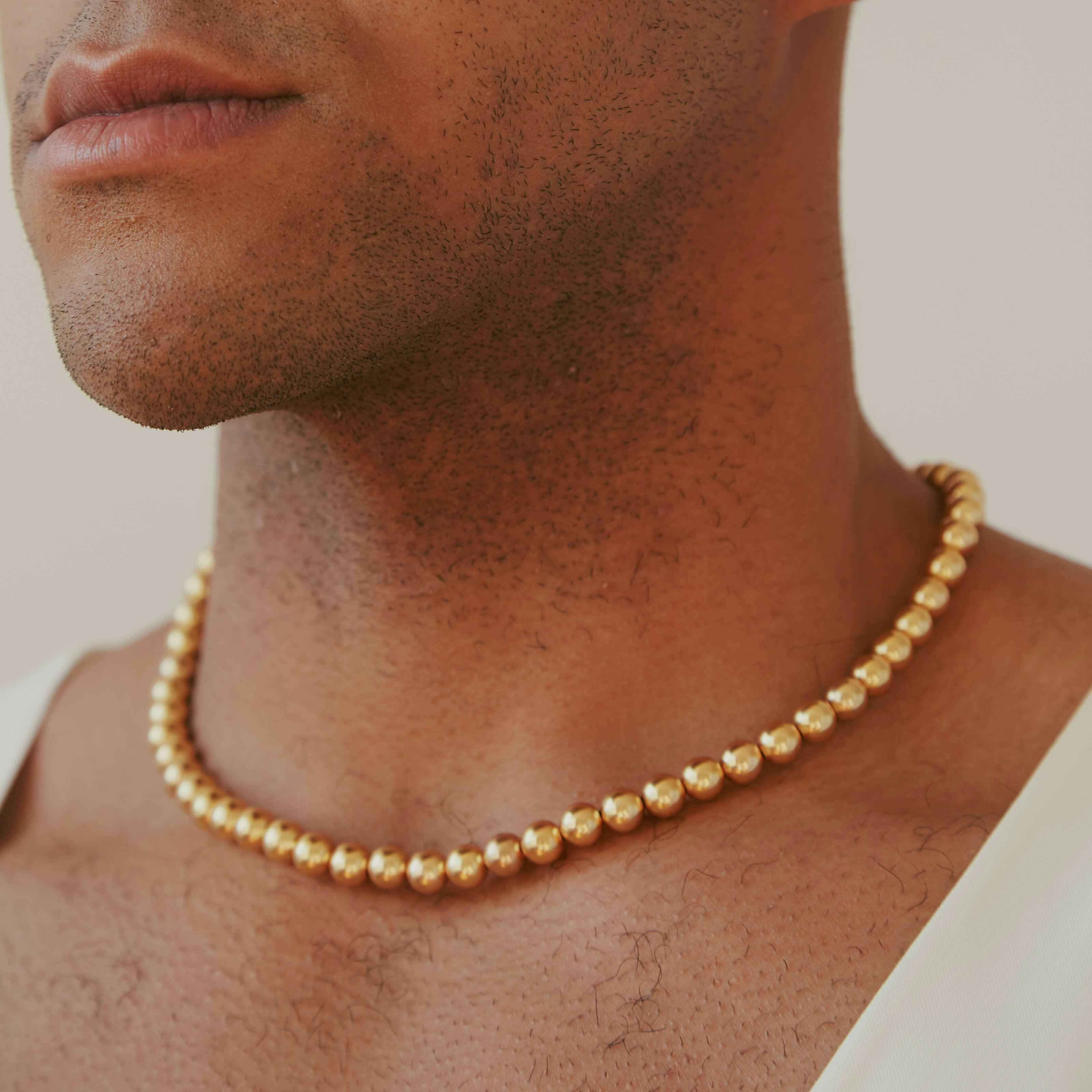 Industrial Pearl Necklace (Gold) on model