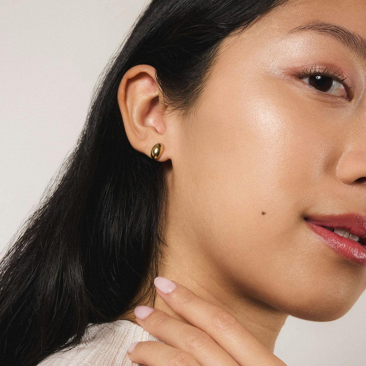 Mini Oval Studs in Gold - On Model