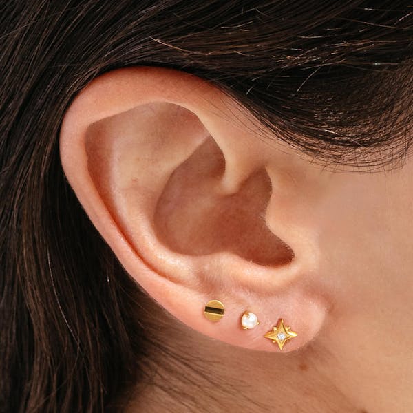 Pearl Nap Earrings in Gold on model
