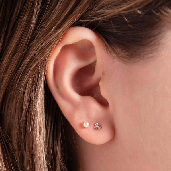 Mini Crystal Trinity Nap Earrings in Gold on model