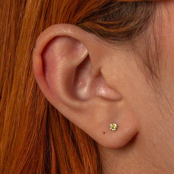 Peridot Nap Earrings in Gold on model