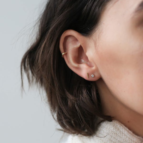Tiny Crystal Nap Earrings in Gold on model