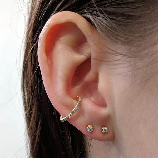 Tiny Sapphire Studs in 14k Gold on model