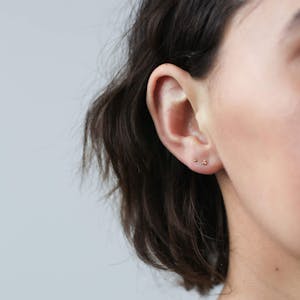 Equilibrium Reversible Pearl Earrings at Maison Miru
