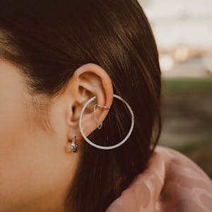 Luna Hoop Earrings in Sterling Silver on model