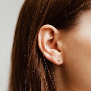 North Star Threaded Flat Back Earring in Gold on model