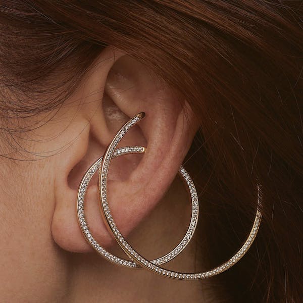 Large Celestial Illusion Hoops in Sterling Silver on model
