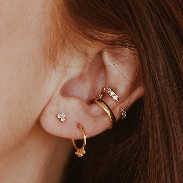 Mini Crystal Trinity Nap Earrings in Gold on model