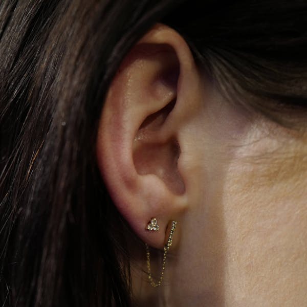 Mini Falling Star Chain Earrings in 14k Gold on model