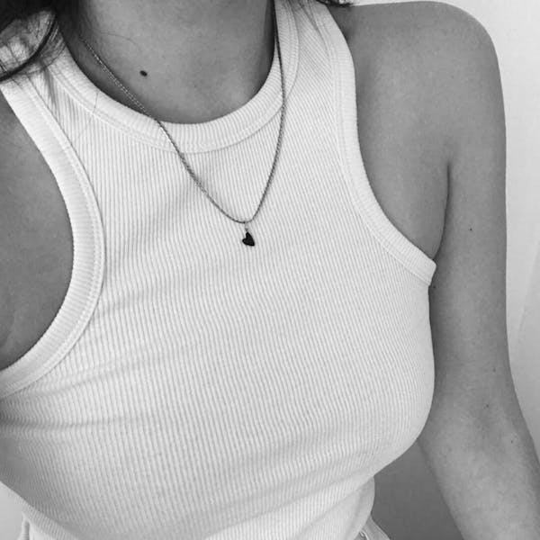 Black Heart Charm Necklace on model