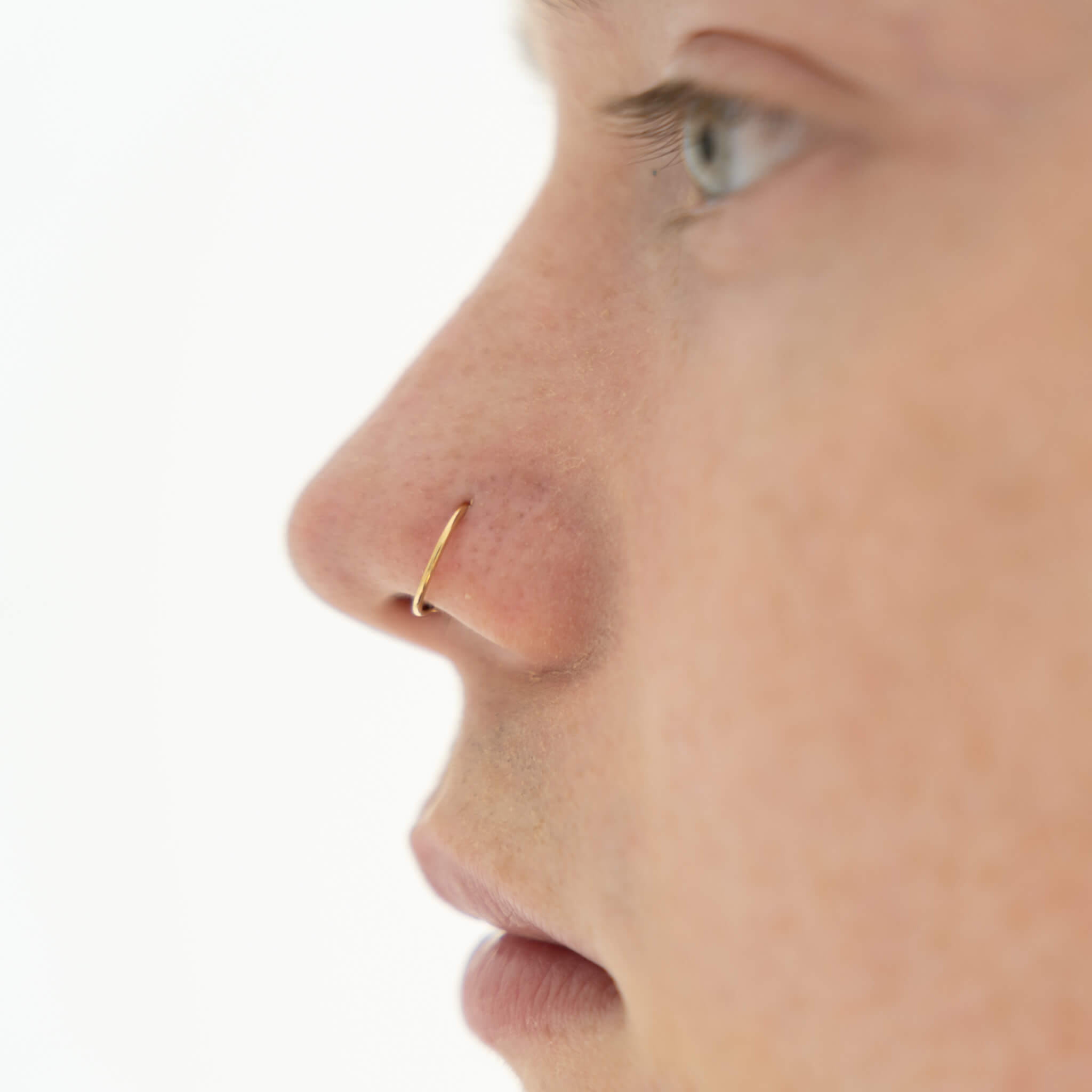 Fancy Gold Nose Pin for the Indian Bride